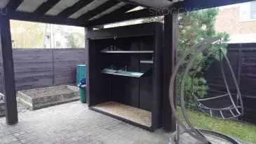 Роллетный шкаф для хранения вещей в серо-коричневом цвете в пос. Пестово, г.о. Мытищи, МО